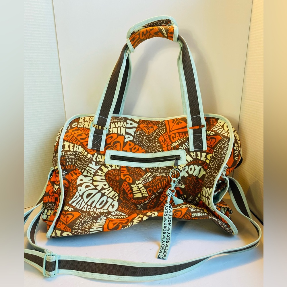 Roxy Duffle Bag 
Missing one snap on strap closure